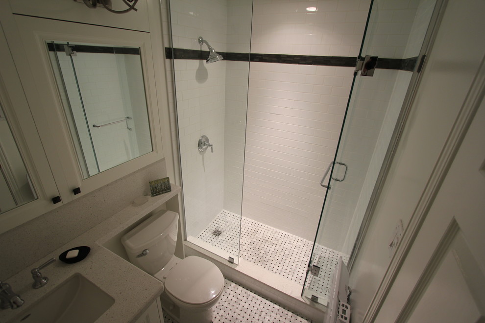 Small arts and crafts master white tile and porcelain tile marble floor alcove shower photo in Toronto with recessed-panel cabinets, white cabinets, a two-piece toilet and white walls