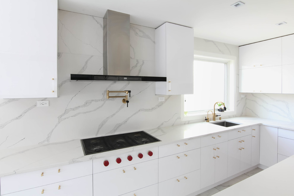 Design ideas for a large contemporary eat-in kitchen in New York with an undermount sink, flat-panel cabinets, white cabinets, quartzite benchtops, multi-coloured splashback, stone slab splashback, stainless steel appliances, ceramic floors, with island, yellow floor and white benchtop.