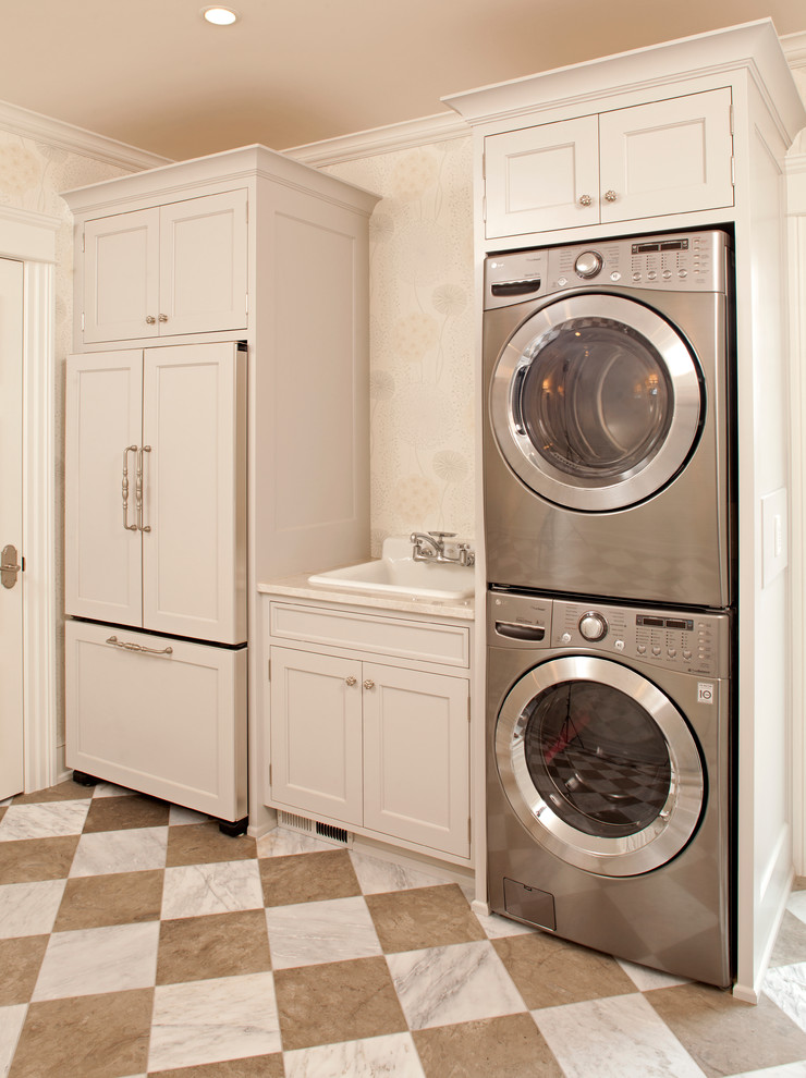 This is an example of a traditional laundry room in Minneapolis with multi-coloured floor.