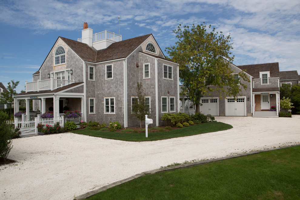 Inspiration for a large coastal gray two-story wood exterior home remodel in Boston