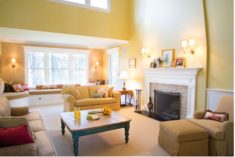 Design ideas for a large transitional open concept living room in Boston with yellow walls, carpet, a standard fireplace, a brick fireplace surround and no tv.