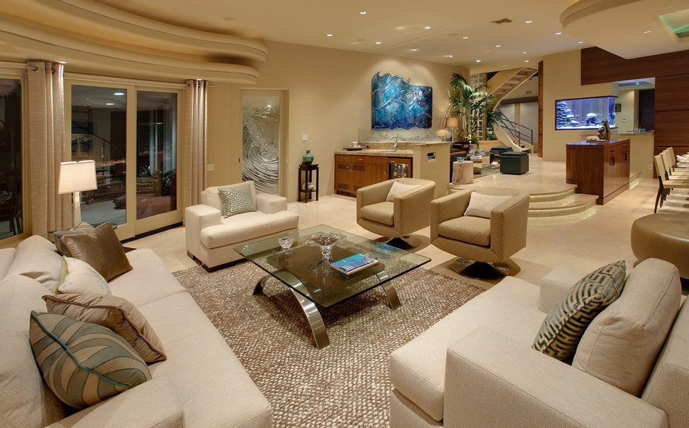 Large tropical formal open concept living room in Orange County with beige walls and ceramic floors.