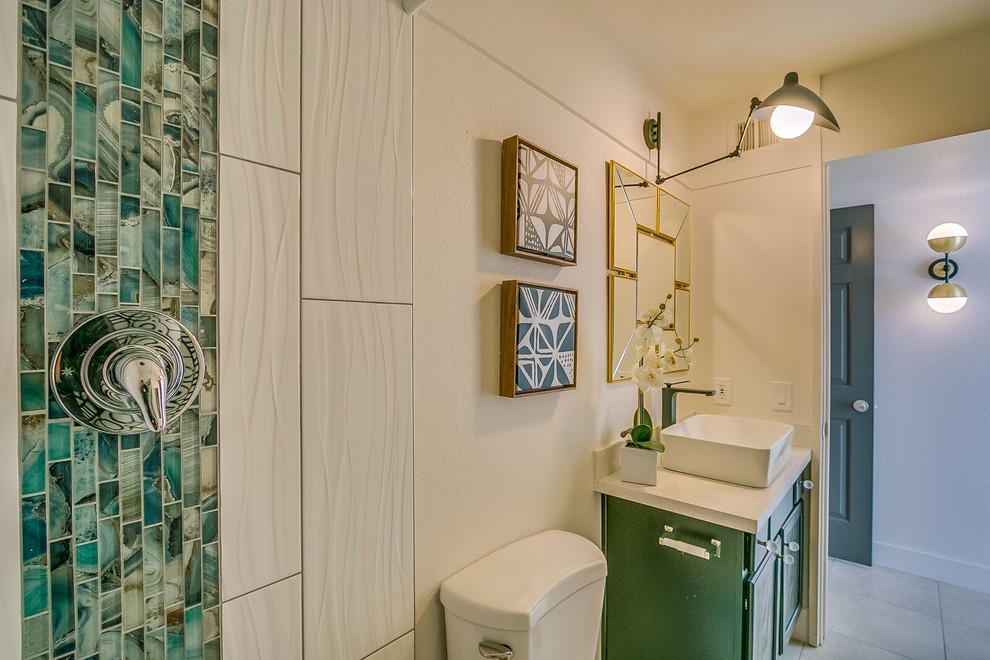 Inspiration for a mid-sized transitional 3/4 green tile and matchstick tile porcelain tile and gray floor alcove shower remodel in Phoenix with recessed-panel cabinets, green cabinets, a two-piece toilet, beige walls, a drop-in sink and quartz countertops