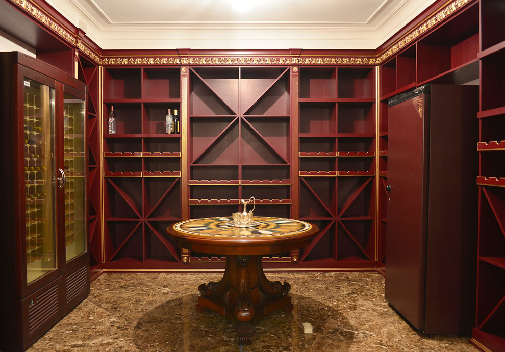 Photo of a large traditional wine cellar in Moscow with marble floors and diamond bins.