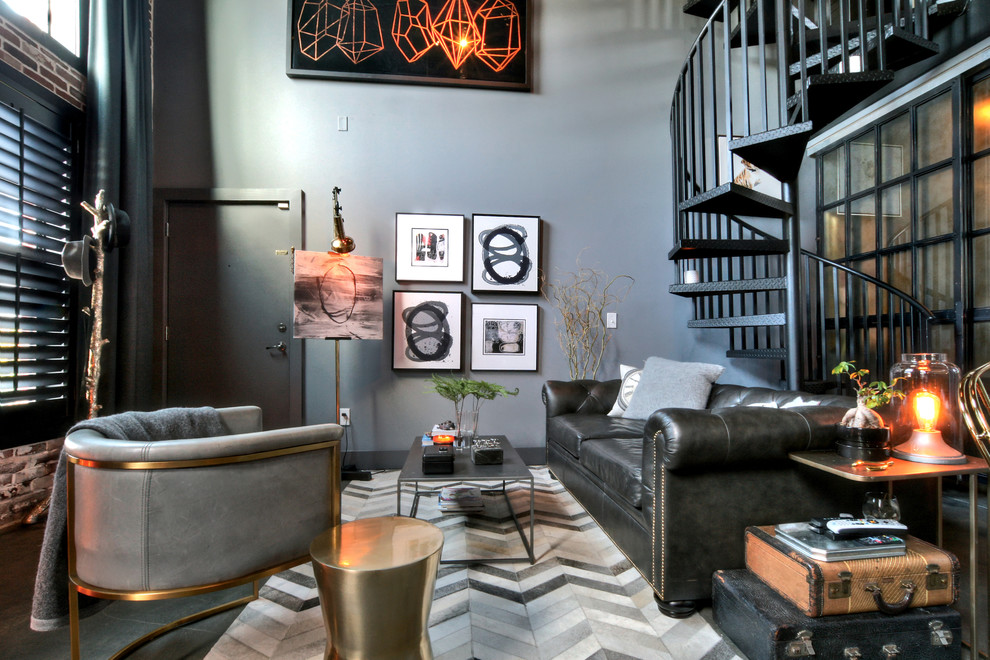 Inspiration for an industrial open concept living room in Miami with grey walls and no fireplace.