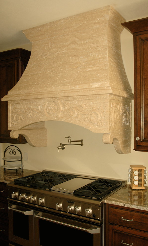 Inspiration for a mediterranean kitchen remodel with granite countertops and stainless steel appliances