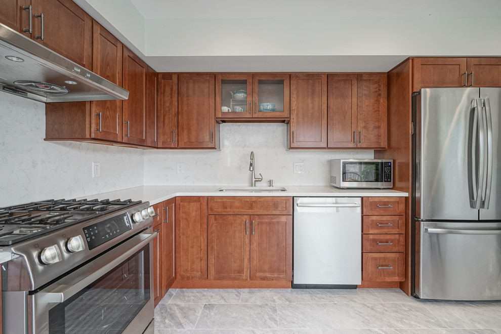 Example of a mid-sized transitional kitchen design in Philadelphia