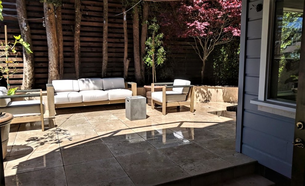 Split Level Travertine Patio and Ipe Deck with Cable Railing