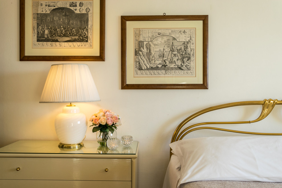 Inspiration for a traditional bedroom in Florence with white walls.