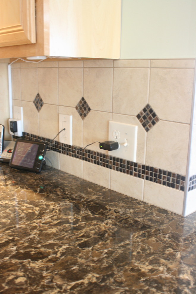 Inspiration for a mid-sized transitional l-shaped ceramic tile open concept kitchen remodel with an undermount sink, recessed-panel cabinets, light wood cabinets, quartz countertops, beige backsplash, ceramic backsplash, stainless steel appliances, green walls and a peninsula