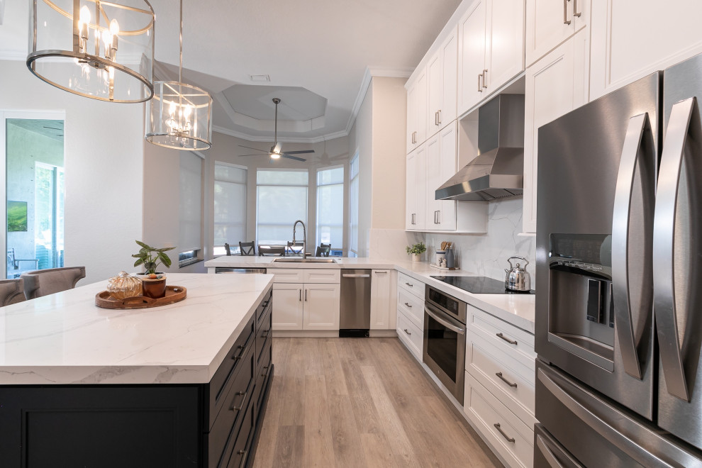 Example of a transitional kitchen design in Miami
