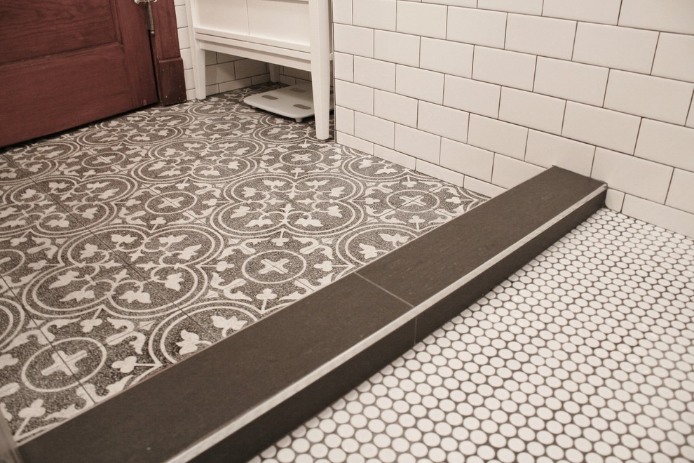 Home design - small transitional 3/4 white tile and subway tile cement tile floor home design idea in Chicago with furniture-like cabinets, a one-piece toilet, beige walls and a pedestal sink