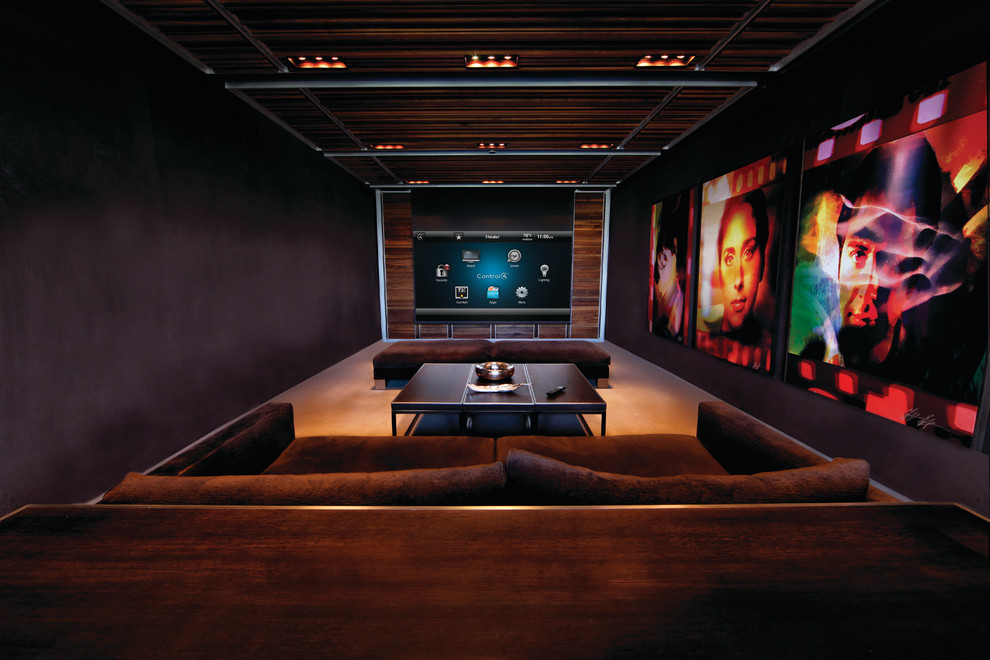 Inspiration for a contemporary home theatre in Salt Lake City with black walls.
