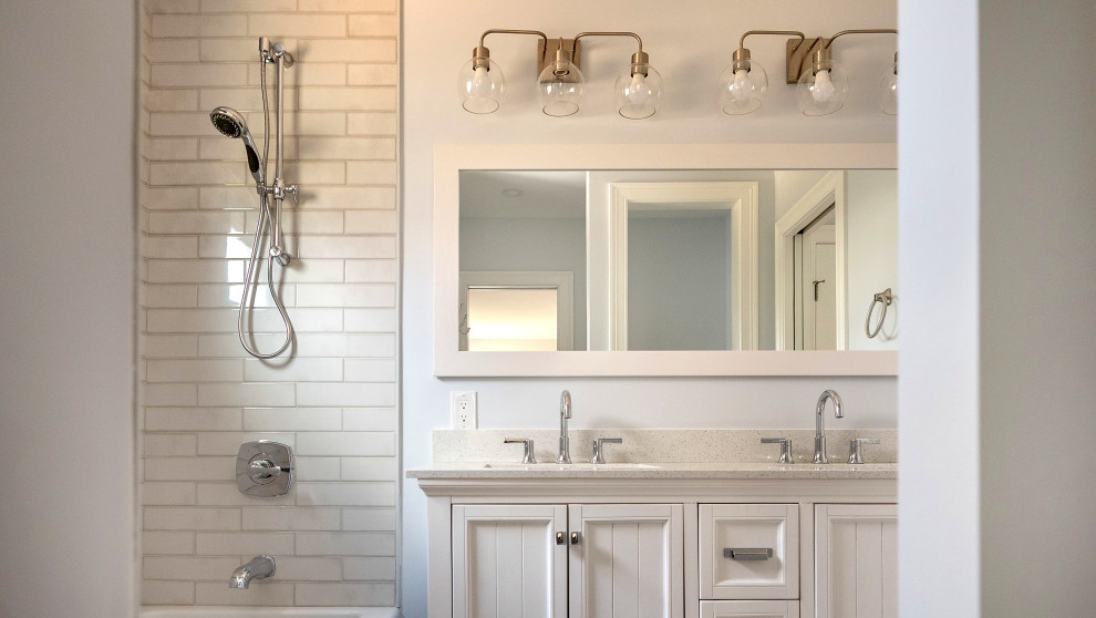 White Vanity with Brass Globe Light Bar
