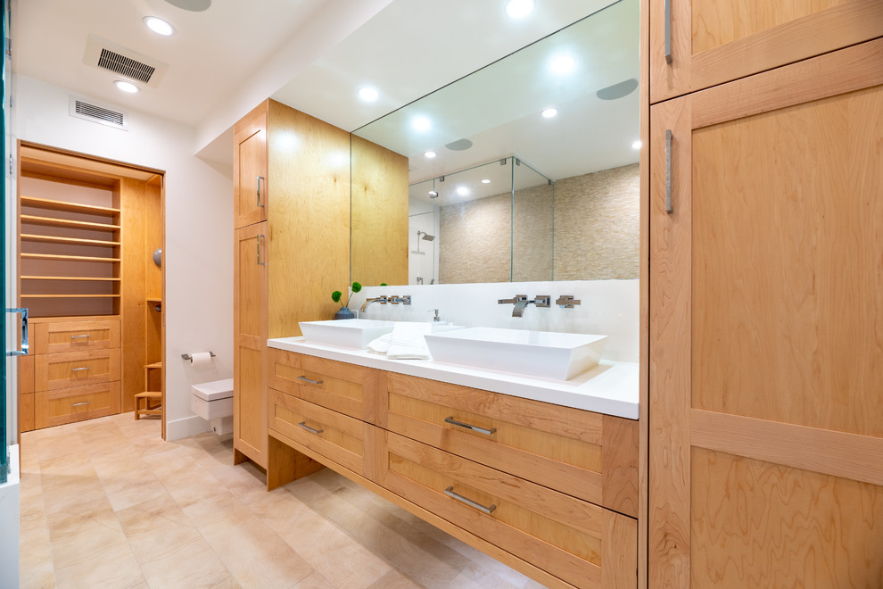 Freestanding bathtub - huge contemporary master beige tile and mosaic tile porcelain tile and beige floor freestanding bathtub idea in Los Angeles with shaker cabinets, light wood cabinets, a wall-mount toilet, white walls, a vessel sink, quartz countertops and white countertops