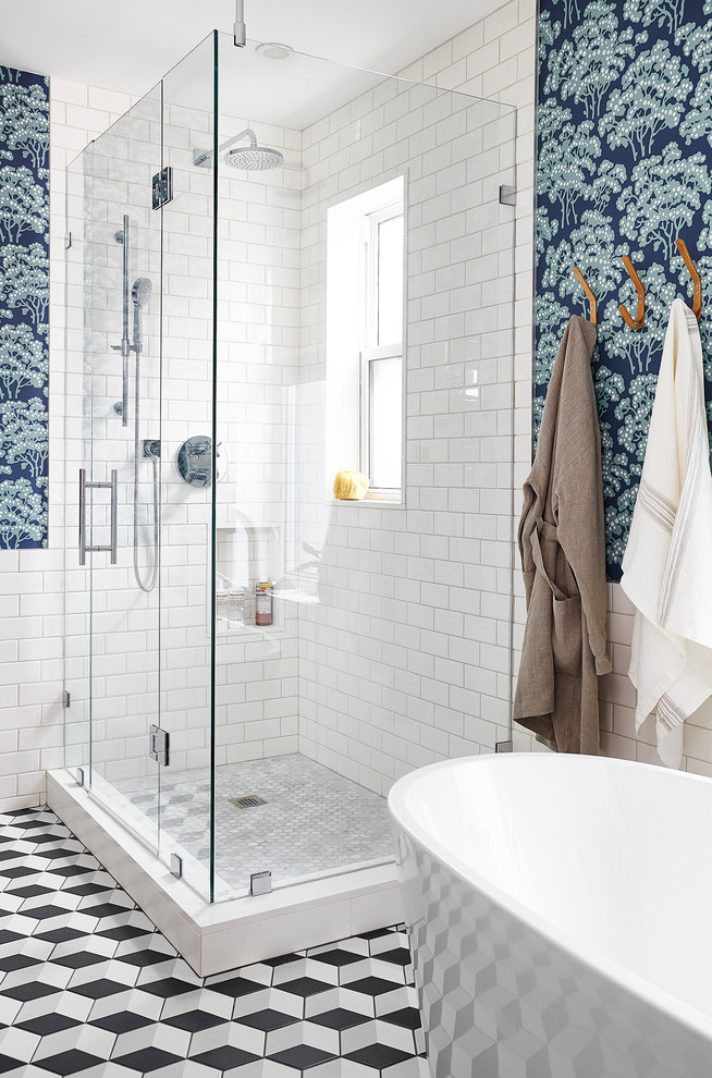 Freestanding bathtub - transitional master gray tile, white tile and subway tile mosaic tile floor freestanding bathtub idea in Toronto with multicolored walls and a hinged shower door
