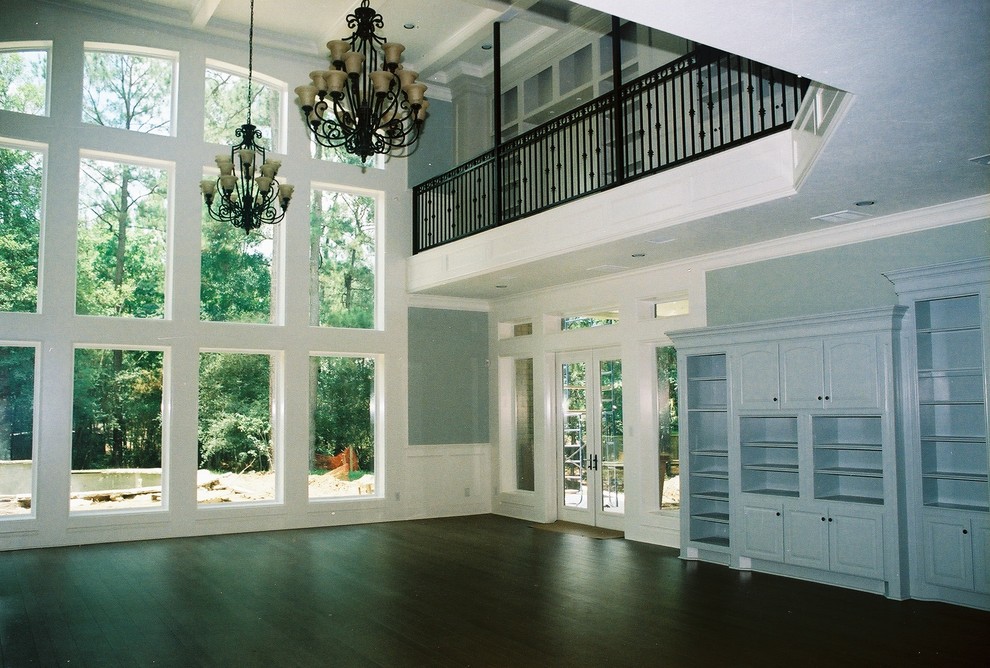 Inspiration for a large transitional open plan dining in Houston with blue walls, dark hardwood floors and no fireplace.