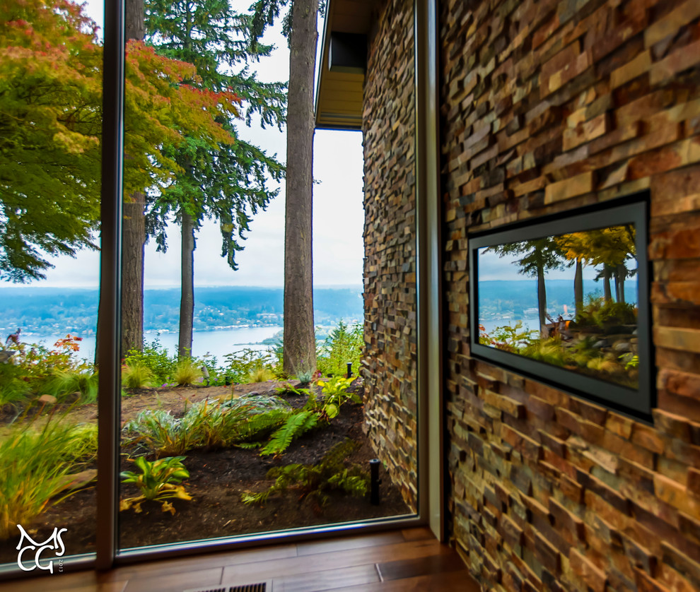 Example of a mountain style home design design in Seattle