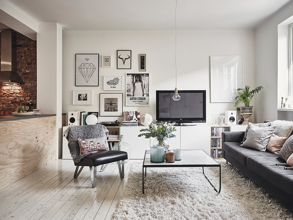 Mid-sized scandinavian open concept living room in Gothenburg.