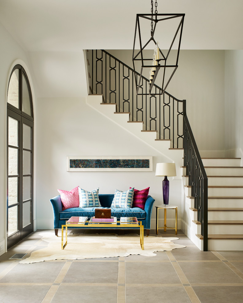 Inspiration for a mid-sized transitional wood u-shaped staircase in Dallas with painted wood risers.