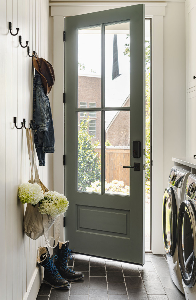 Example of a farmhouse laundry room design in Charlotte