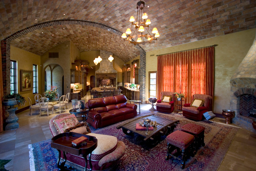 Photo of an expansive mediterranean living room in Orange County with yellow walls.