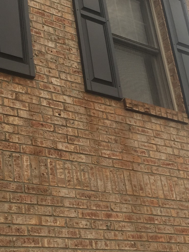 Need help identifying the cause of stain on brick