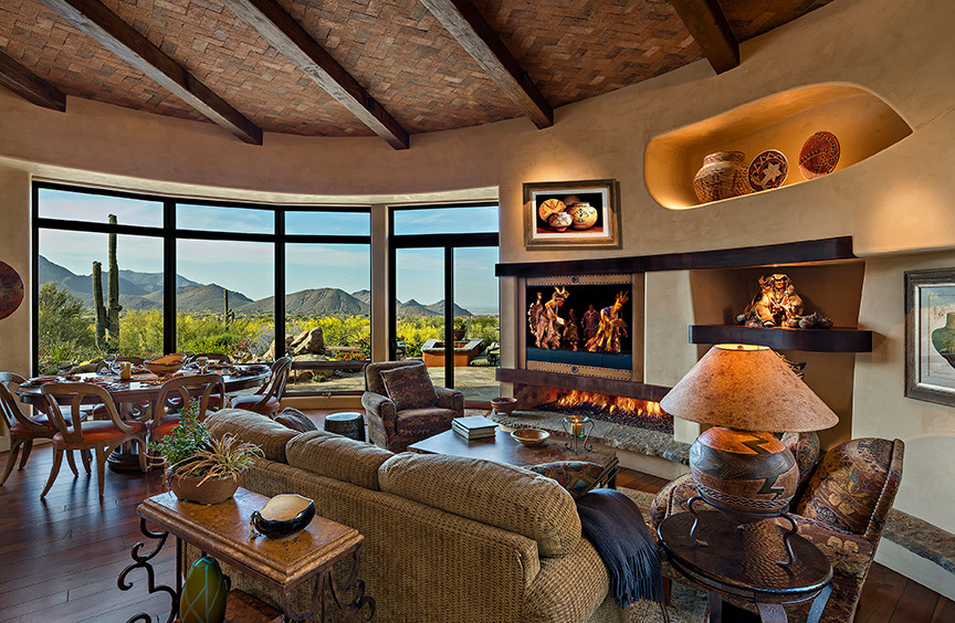 Open concept living room in Phoenix with medium hardwood floors and a ribbon fireplace.