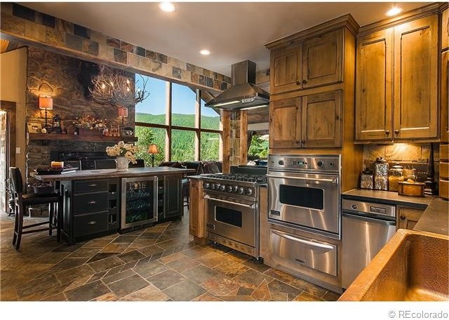 Inspiration for a rustic kitchen remodel in Denver