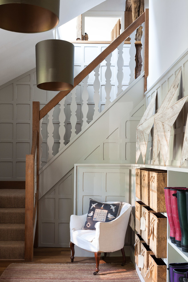 Design ideas for a country l-shaped staircase in Gloucestershire.