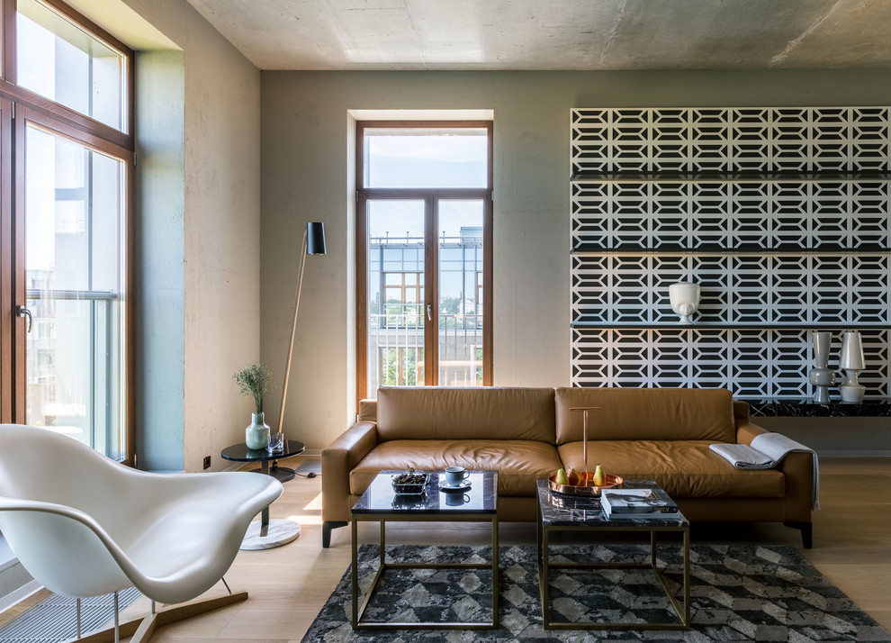 Design ideas for an industrial formal open concept living room in Saint Petersburg with grey walls, medium hardwood floors and brown floor.