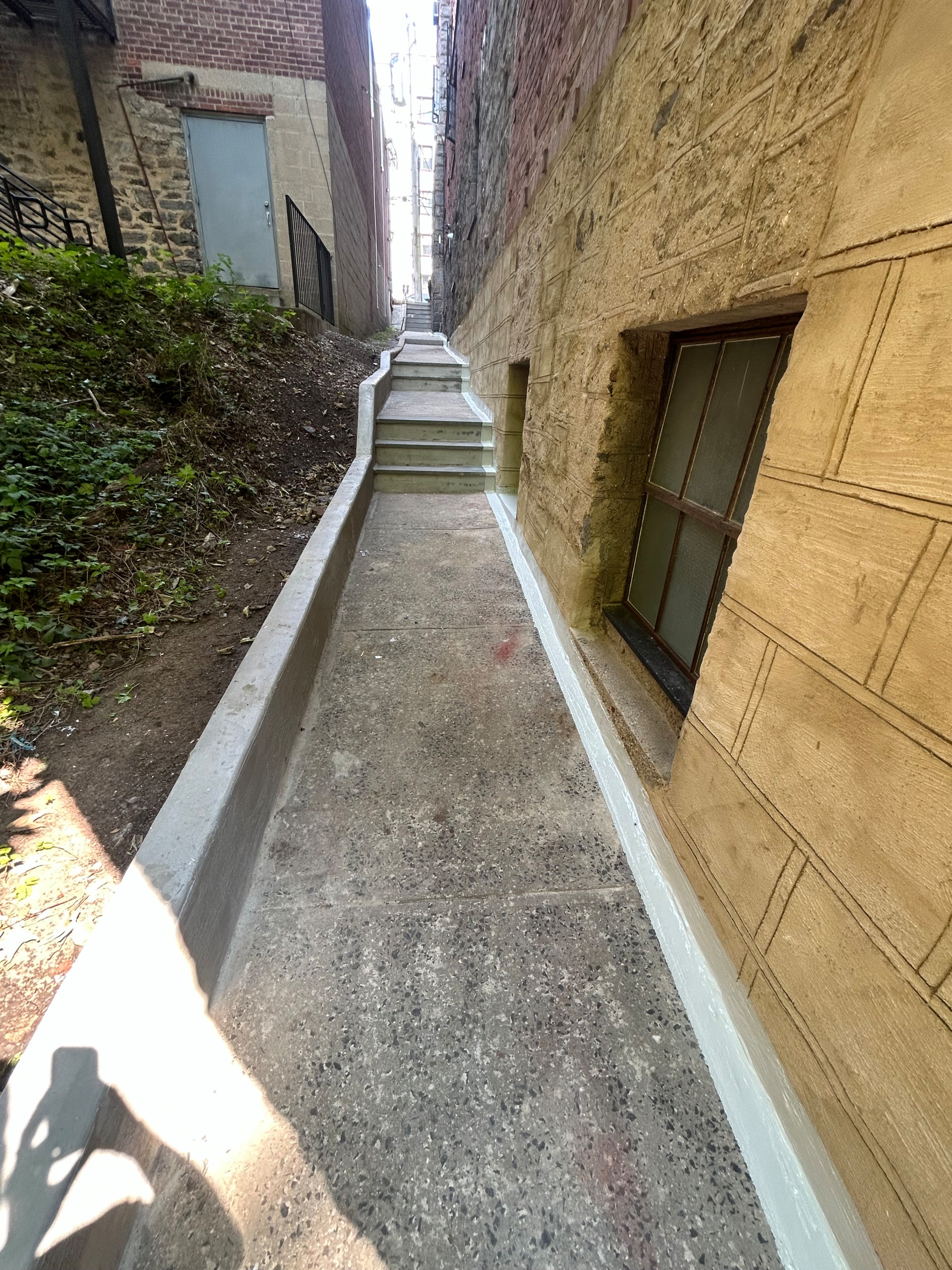 Curb/Exterior Wall Stucco/ParaPro Flashing/Garage slab replacement/Drainage