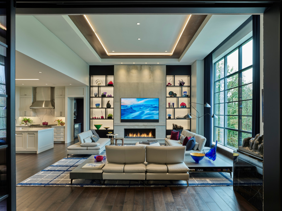 Photo of a large contemporary open plan games room in Nashville with a ribbon fireplace, a stone fireplace surround, a wall mounted tv, brown floors and a coffered ceiling.