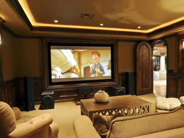 This is an example of a mediterranean home theatre in Phoenix.