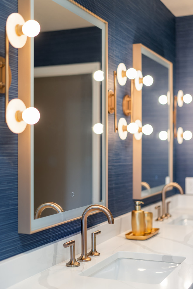 Alcove bathtub - small transitional porcelain tile, gray floor and double-sink alcove bathtub idea with shaker cabinets, white cabinets, a one-piece toilet, blue walls, an undermount sink, quartz countertops, white countertops and a built-in vanity