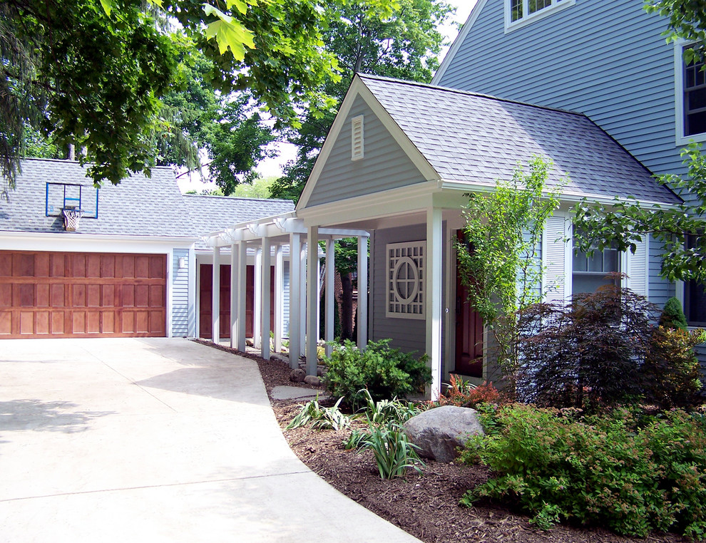 Traditional wood exterior home idea in Detroit