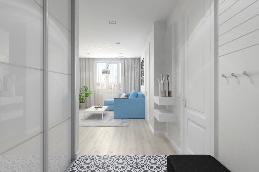 Гостиная комната с голубым диваном