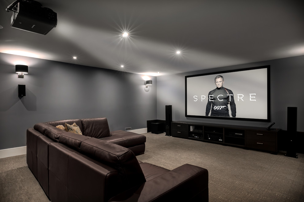 Design ideas for an expansive contemporary open concept home theatre in Calgary with grey walls, carpet and a wall-mounted tv.