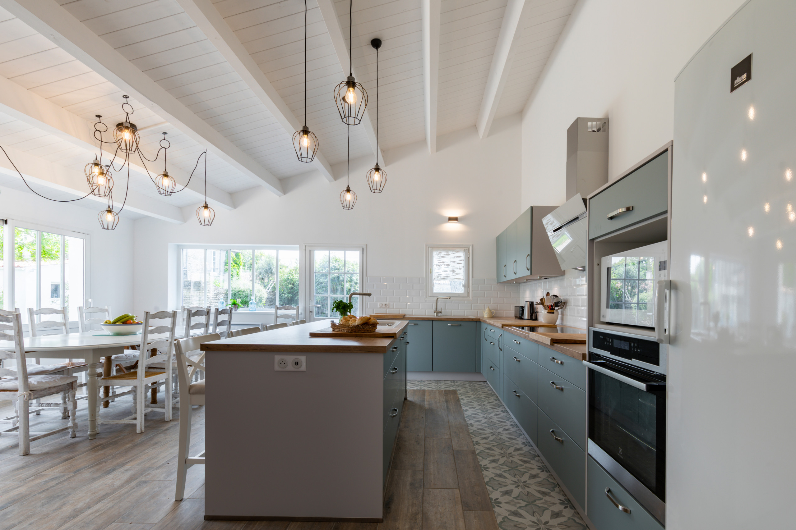Transformation d'une chambre parentale en pièce de vie/cuisine