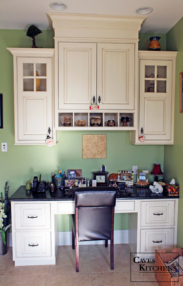 This is an example of a large traditional u-shaped eat-in kitchen in New York with beaded inset cabinets, white cabinets, granite benchtops, an undermount sink, ceramic floors and with island.
