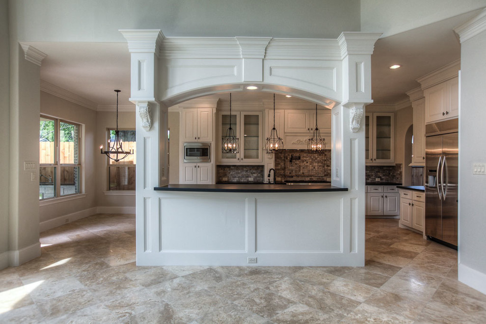 Example of a transitional kitchen design in Houston