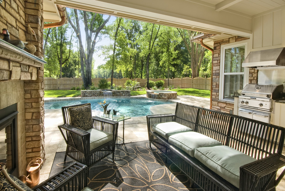 Photo of a transitional patio in Other with an outdoor kitchen.