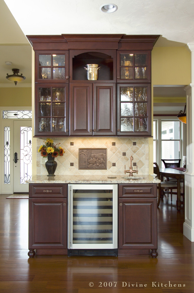 Inspiration for a large timeless l-shaped dark wood floor eat-in kitchen remodel in Boston with a double-bowl sink, beaded inset cabinets, dark wood cabinets, granite countertops, beige backsplash, ceramic backsplash, stainless steel appliances and an island