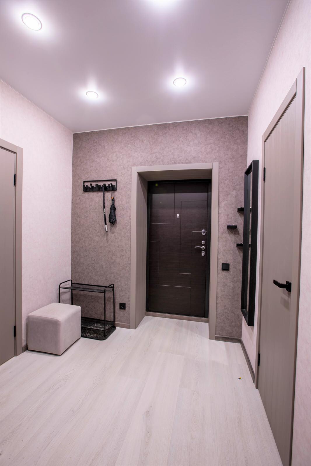 Дизайн - проект однокомнатной квартиры для молодой пары. Фотографии реализации.