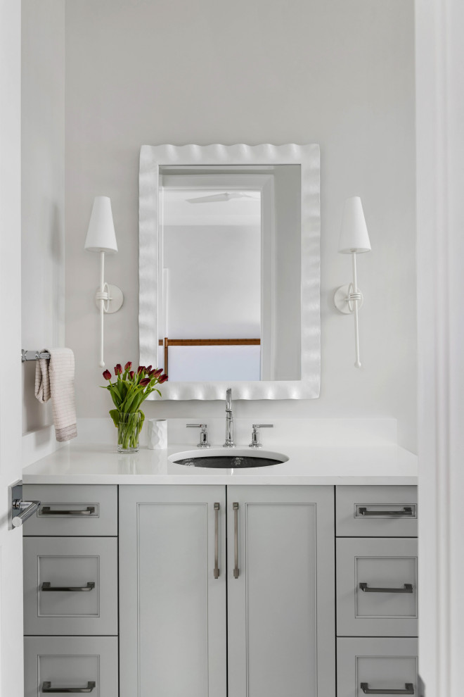Inspiration for a coastal powder room remodel in Tampa