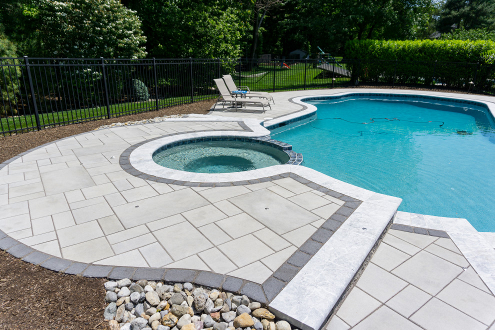 Holmdel, NJ: Paver Patio Installation Surrounding Inground Pool