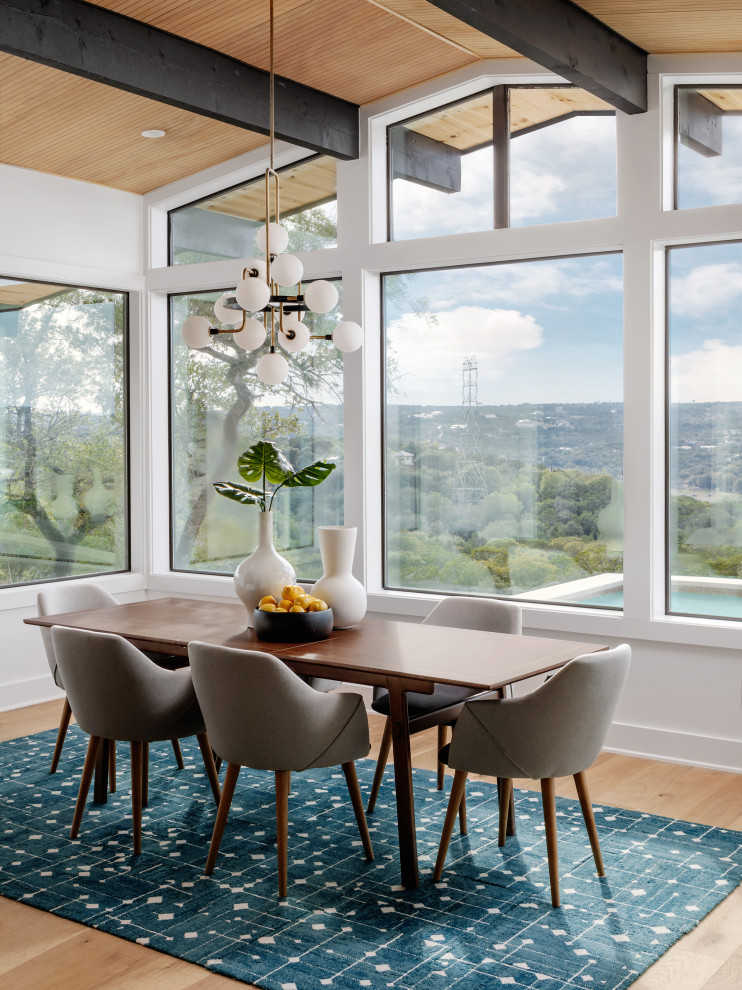 Inspiration for a mid-sized 1950s medium tone wood floor, beige floor and wood ceiling kitchen/dining room combo remodel in San Francisco with white walls