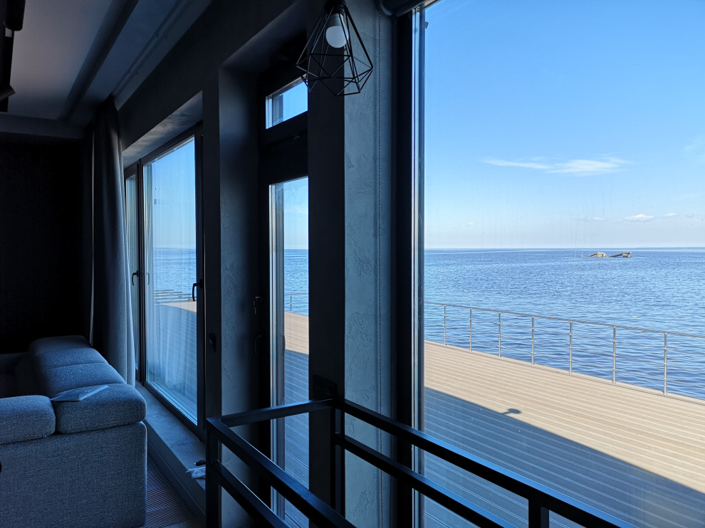 Частный дом на берегу залива. Отделка декоративной штукатуркой