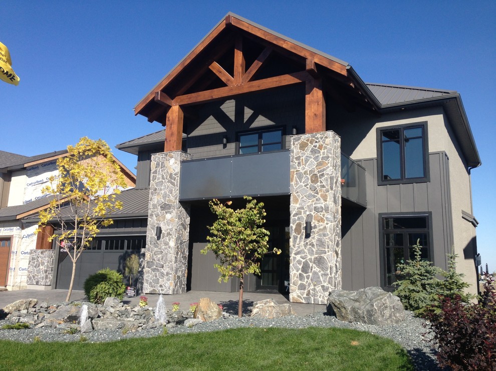 Inspiration for a modern exterior in Other with stone veneer.