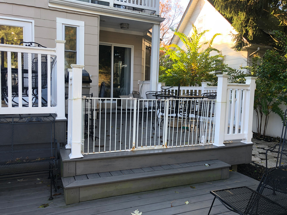 Mid-sized elegant backyard deck photo in Newark with no cover